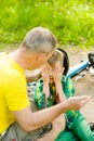 Father calms son that fell from the bike