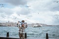 father carrying daughter on his shoulder enjoying the view of bosphorus Royalty Free Stock Photo