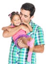 Father carrying and kissing his funny small multiracial daughter