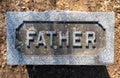 Close up of FATHER cemetery grave stone Royalty Free Stock Photo