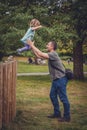 Father catching daughter Royalty Free Stock Photo