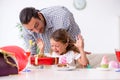 Father celebrating birthday with his daughter