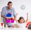 Father celebrating birthday with his daughter