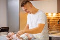 Father is changing nappy to his baby boy Royalty Free Stock Photo