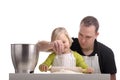 Father and child cooking together