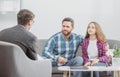 Father and child daughter with girl discussing problems in family with family psychologist. Discussion of family Royalty Free Stock Photo