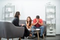 Father and child daughter with girl discussing problems in family with family psychologist. Social worker counseling Royalty Free Stock Photo