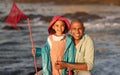 Father, child and family fishing trip while on vacation at a lake or sea together for bonding, happiness and quality Royalty Free Stock Photo