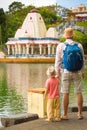 Father and child at Ganga Talao. Mauritius. Royalty Free Stock Photo