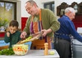 Father child and grandfather cooking Royalty Free Stock Photo