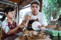 Father and child painting pottery goods Royalty Free Stock Photo