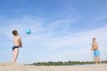 A father and a child are playing  Beach Volleyball.  Sports games on a sunny summer day.  The concept of an active lifestyle Royalty Free Stock Photo