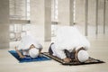 Father and child posing prostration in the mosque