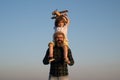 Father and child son playing outside. Memories of childhood. Child pilot aviator with airplane dreams of traveling in Royalty Free Stock Photo