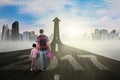 Father and child walk toward arrow with 2017 Royalty Free Stock Photo