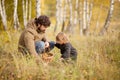 Father and child in the wild forest. Royalty Free Stock Photo