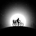 Father with children on bicycle. Family on bike. Full moon in sky