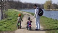 Father and children cycling Royalty Free Stock Photo