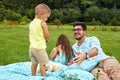 Father With Children Having Fun In Park. Happy Family In Nature Royalty Free Stock Photo
