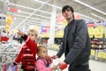 Father with children in shop