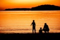 Father and children at sunset Royalty Free Stock Photo