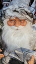 Father Christmas mannequin wearing gold rimmed glasses Royalty Free Stock Photo