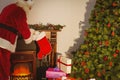 Father christmas stocking gifts at christmas eve Royalty Free Stock Photo