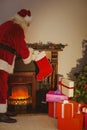 Father christmas stocking gifts at christmas eve Royalty Free Stock Photo