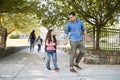 Father In Collecting Daughter At The End Of School