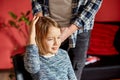 Father combing, brushing his daughter's hair at home Royalty Free Stock Photo