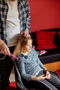 Father combing, brushing his daughter`s hair at home Royalty Free Stock Photo