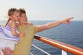 Father on cruise liner deck, carrying daughter Royalty Free Stock Photo