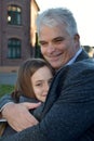 Father his teenage daughter hugging each other Royalty Free Stock Photo