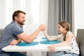 Father and Daughter Armwrestling