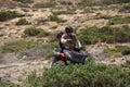 Father and daughter on an ATV