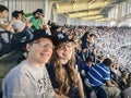 Father and daughter at baseball game