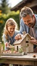 Father-daughter bonding time over a creative DIY birdhouse project in the backyard