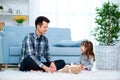 Father and daughter or brother and sister with a gift in the interior of the room. Father`s day holiday concept, Children`s Day Royalty Free Stock Photo