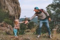 Father and daughter child hands holding traveling together family hiking outdoor Royalty Free Stock Photo