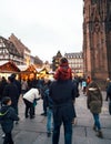 Father and daughter on choulders walking Christmas Market Royalty Free Stock Photo