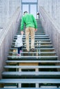 Father and daughter climbing upstairs Royalty Free Stock Photo