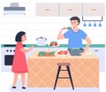 Father and daughter cooking together in kitchen. Parent and child happy family cutting vegetables