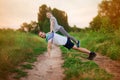 Father and daughter do acrobatic exercises Royalty Free Stock Photo