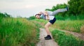 Father and daughter do acrobatic exercises Royalty Free Stock Photo