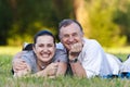 Father and daughter on grass