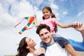 Father And Daughter Having Fun Flying Kite On Beach Holiday Royalty Free Stock Photo