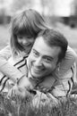 Father and daughter having fun on spring meadow Royalty Free Stock Photo