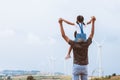 Father and daughter having fun to play together. Asian child girl riding on father`s shoulders Royalty Free Stock Photo