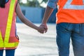 Father and daughter holding hand at Container cargo site. Business heir concept.