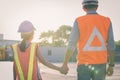 Father and daughter holding hand at Container cargo site. Business heir concept.